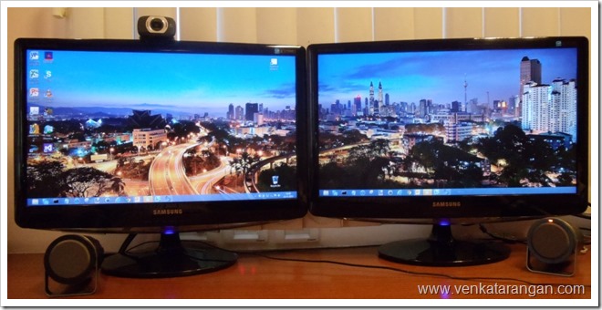 Dual Monitor showing Panoramic Cityscape WallPapers in Windows8