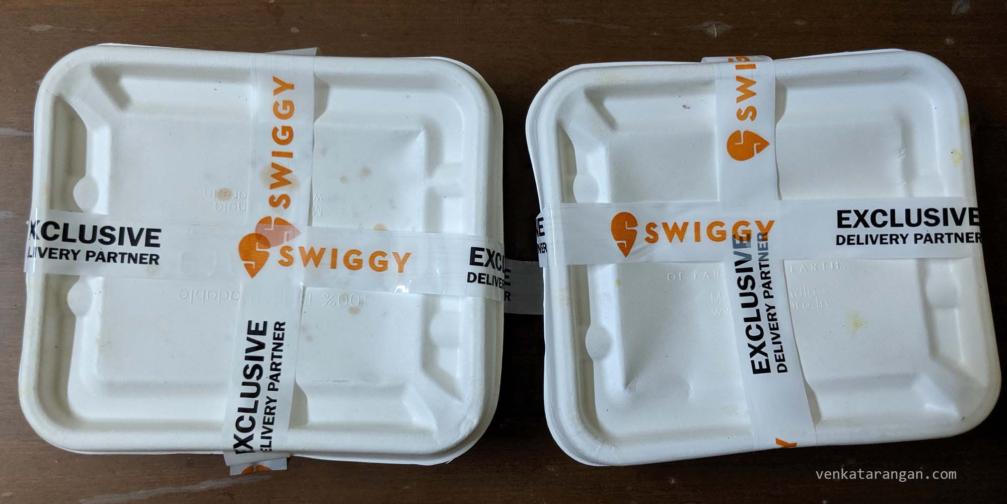 Dinner box sealed with Swiggy tape for assurance
