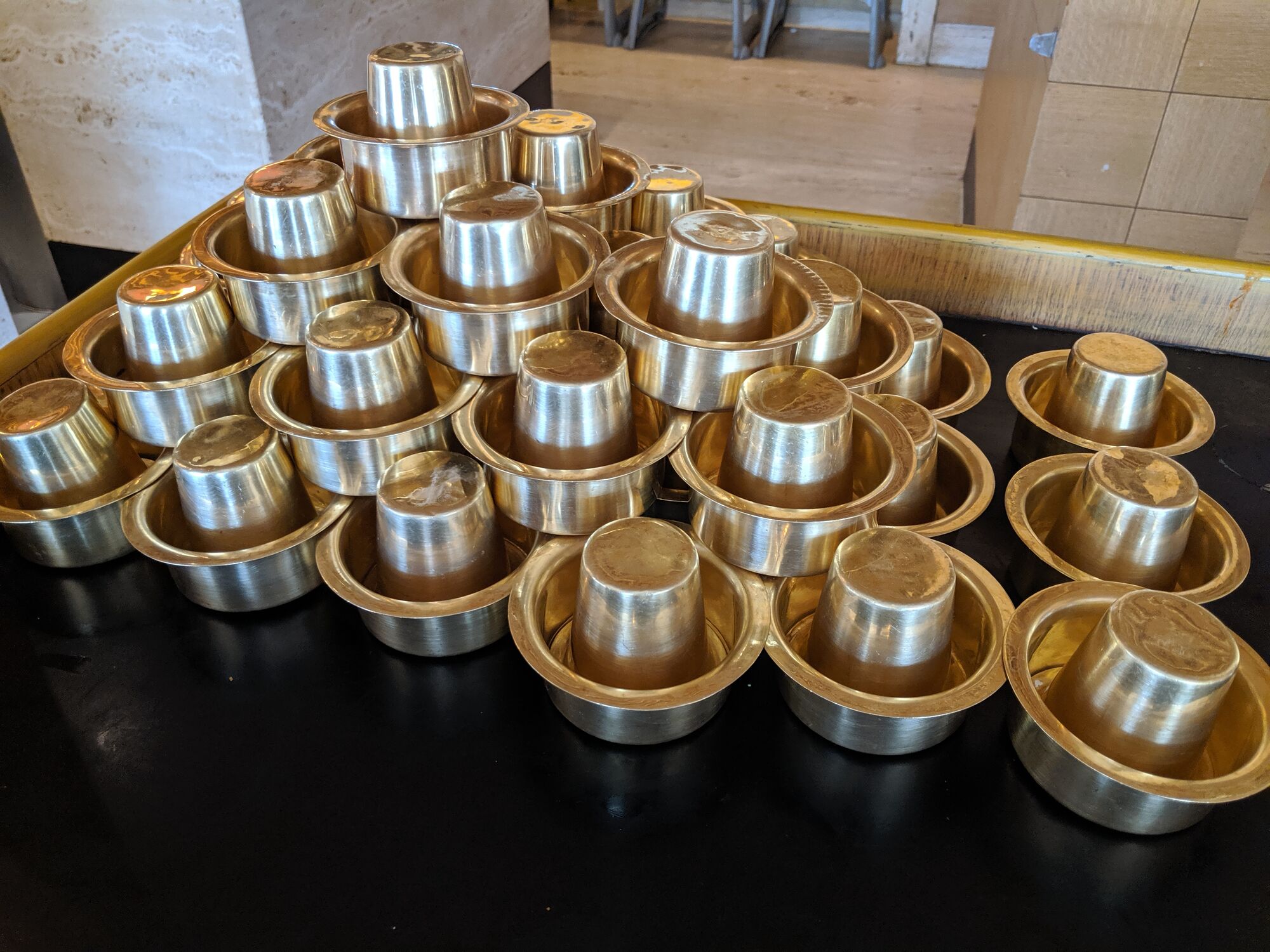Neatly arranged Brass Tumbler and Dabara for Coffee