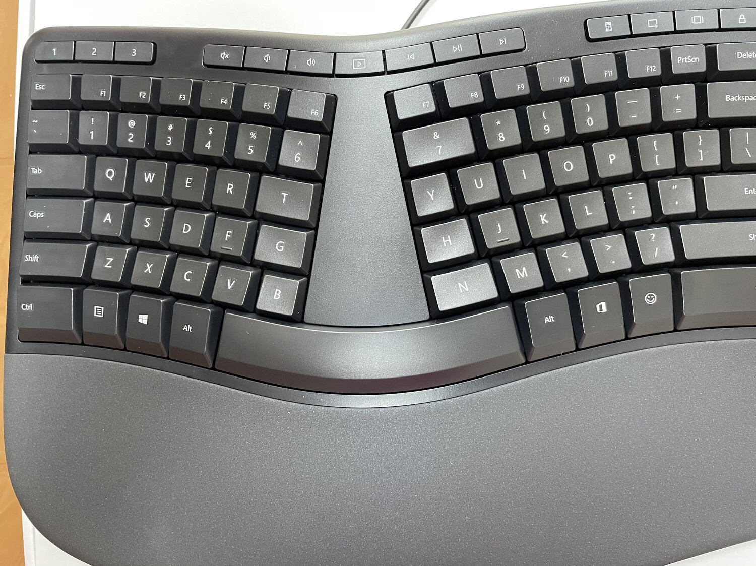 Microsoft Ergonomic Keyboard - split keys, the raised middle column and the large wrist pad