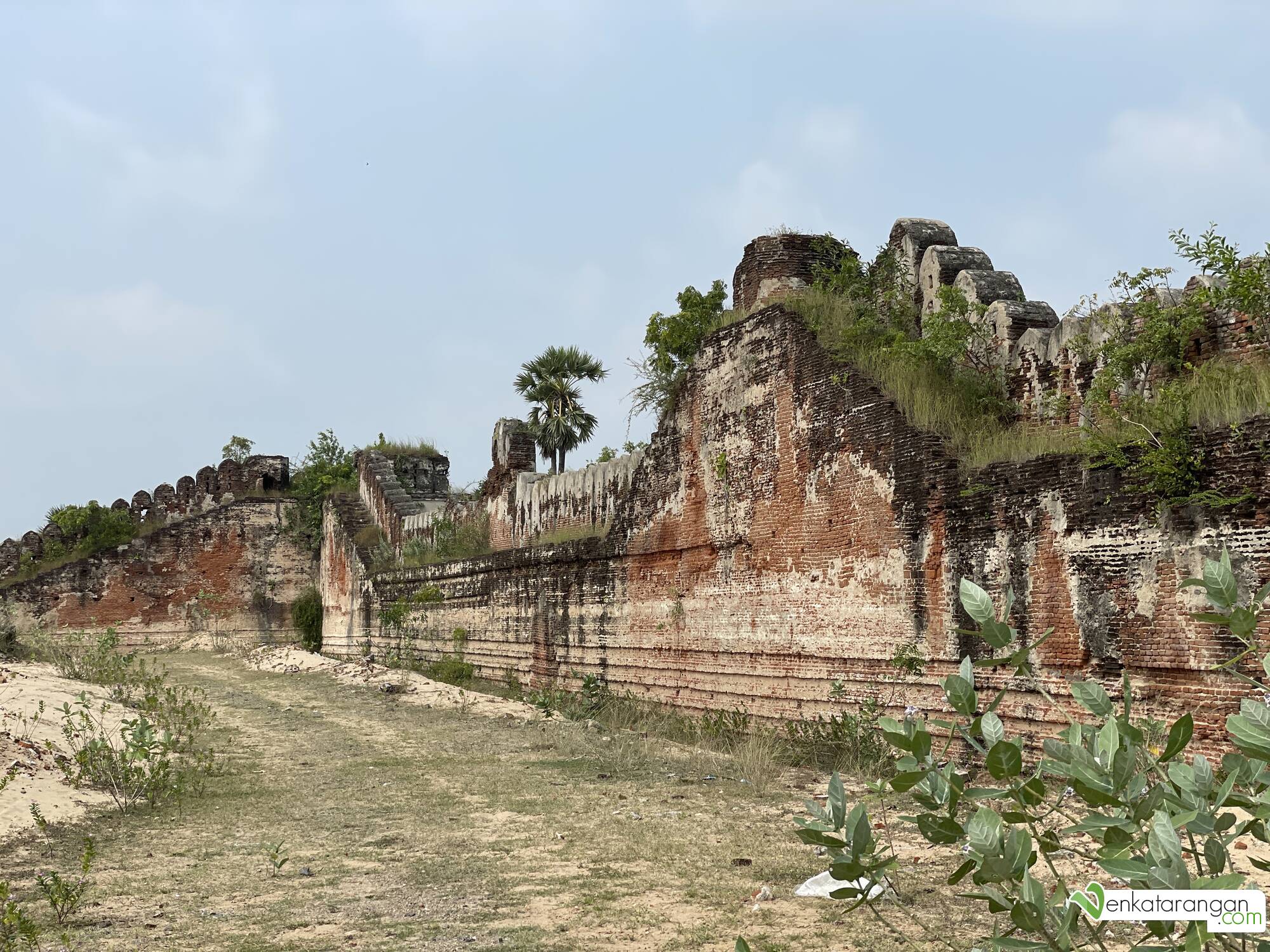The long tall fort walls can be seen intact in this section