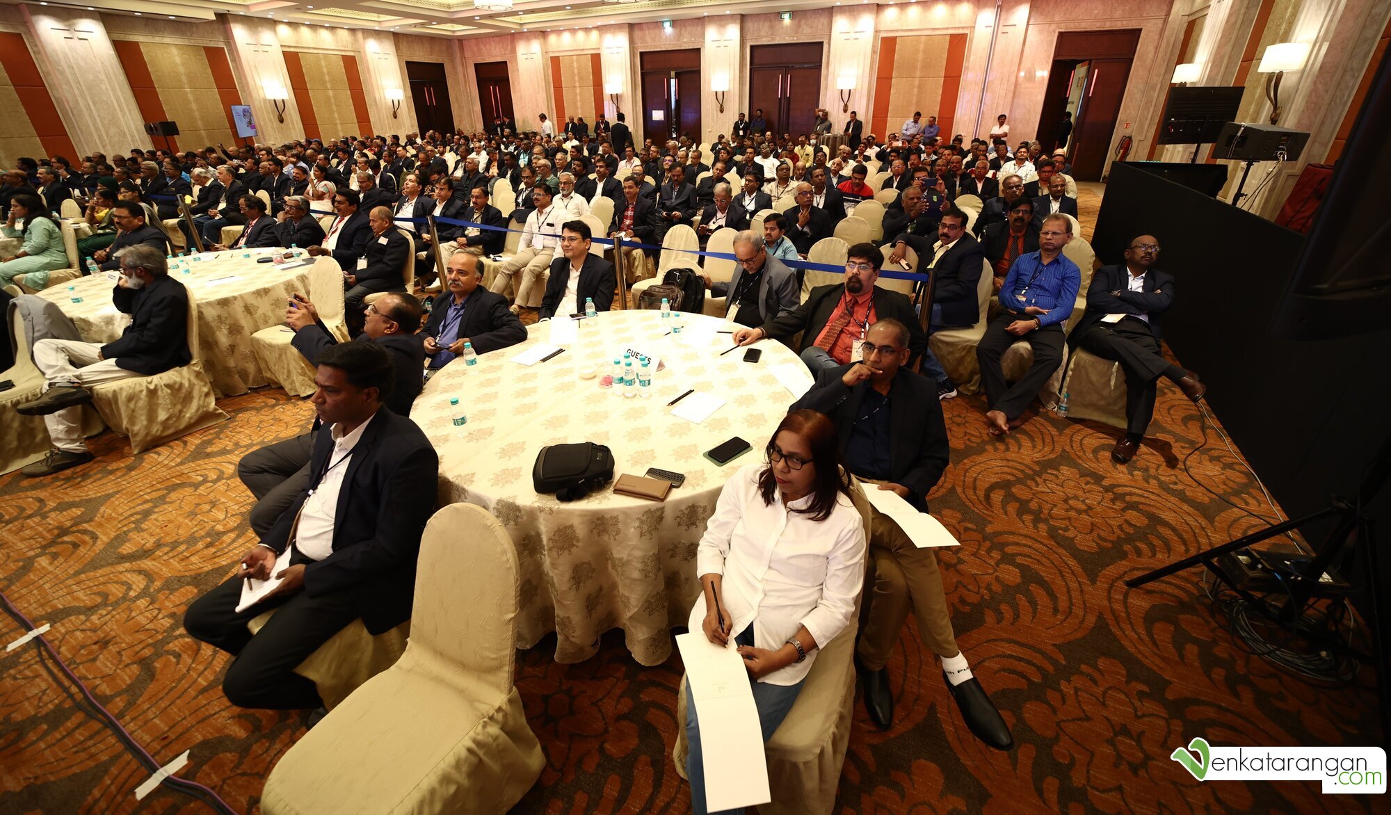 Audience members attentively listening to a presentation about Generative AI and LLM by Venkatararangan Thirumalai, at the IFA Galaxy 2024 event