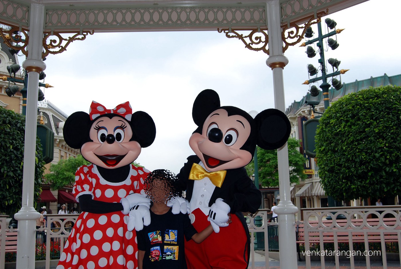 Son loved taking a picture with Mickey and Minnie