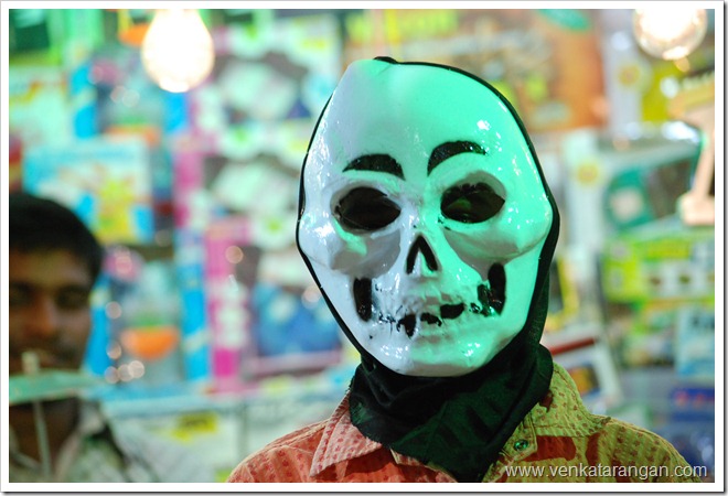 This boy (name was Raja) in a shop posed for me voluntarily with a mask This boy (name was Raja) in a shop posed for me voluntarily with a mask