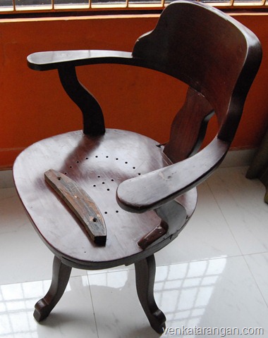 Wooden chair with the timber piece that broke my iPad2