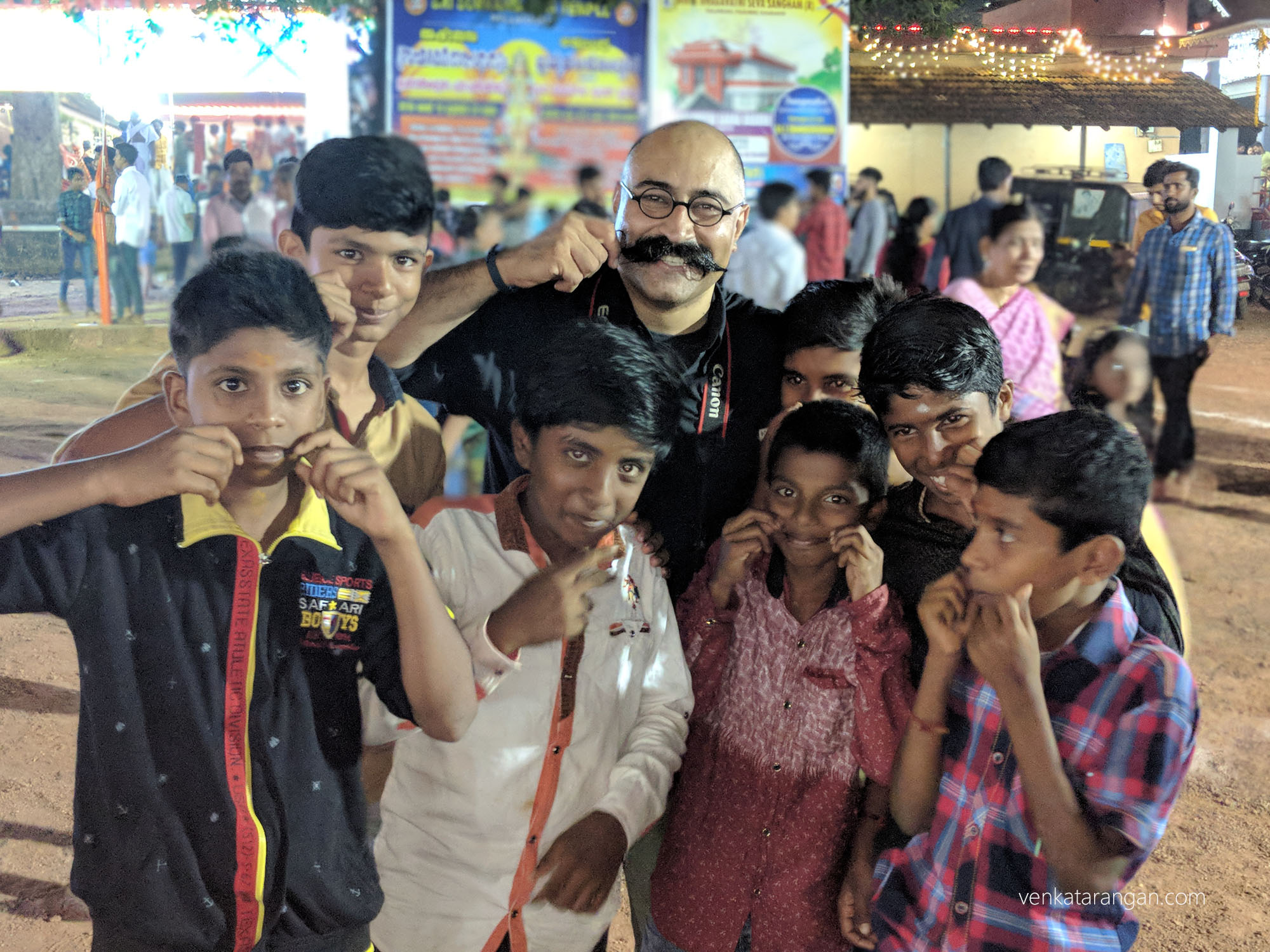 My friend Pravin Shekar showing off his moustache and attracting quite a lot of young admirers 