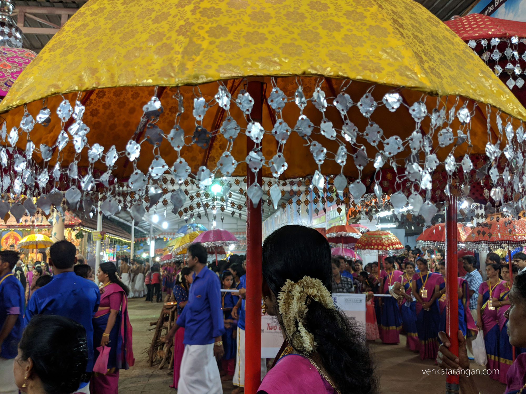 Elaborately decorated umbrellas brought as offerings to the Goddess