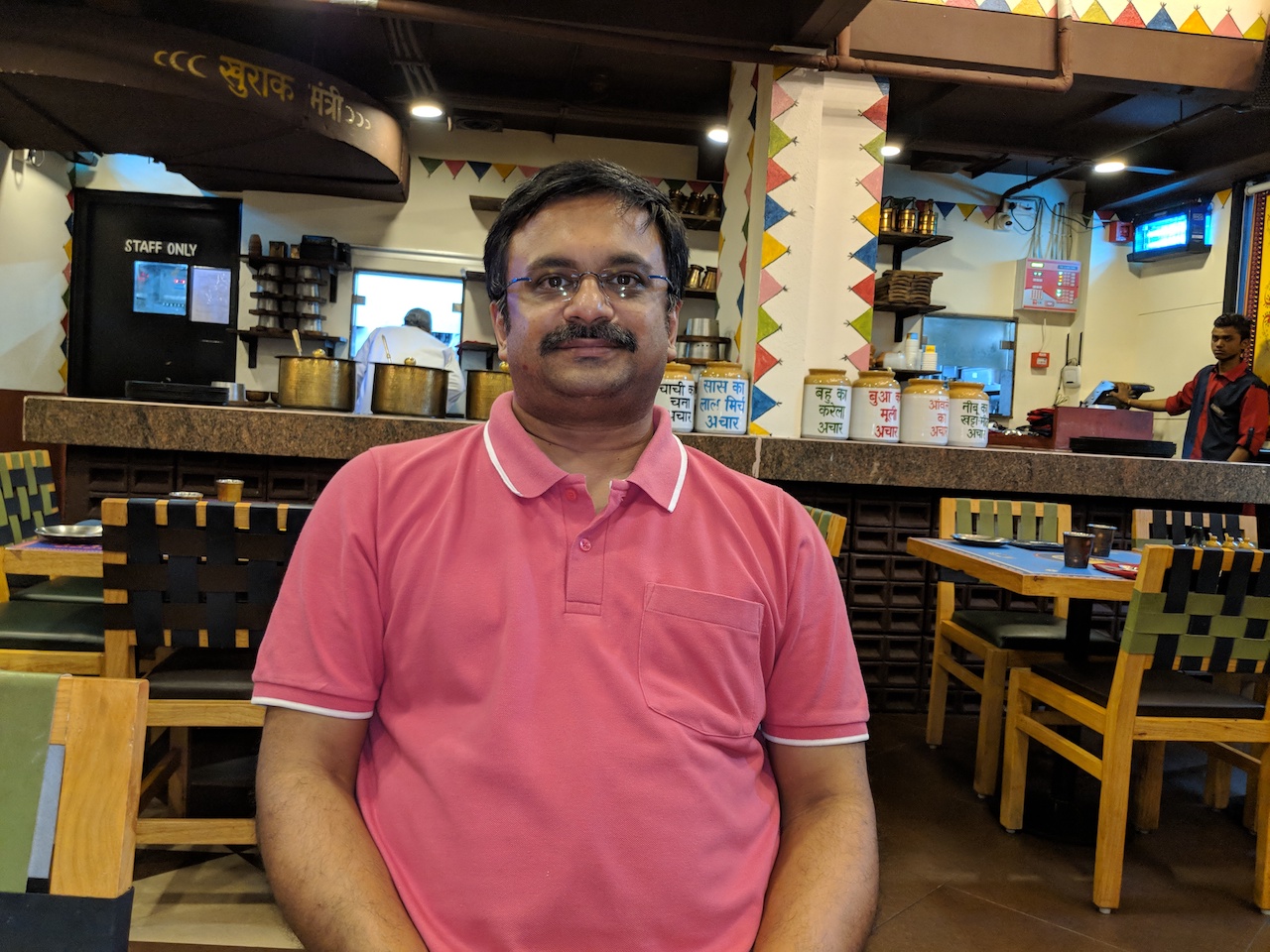Venkatarangan seated in "Dhaba Estd 1986 Delhi", Isphani Centre, Chennai