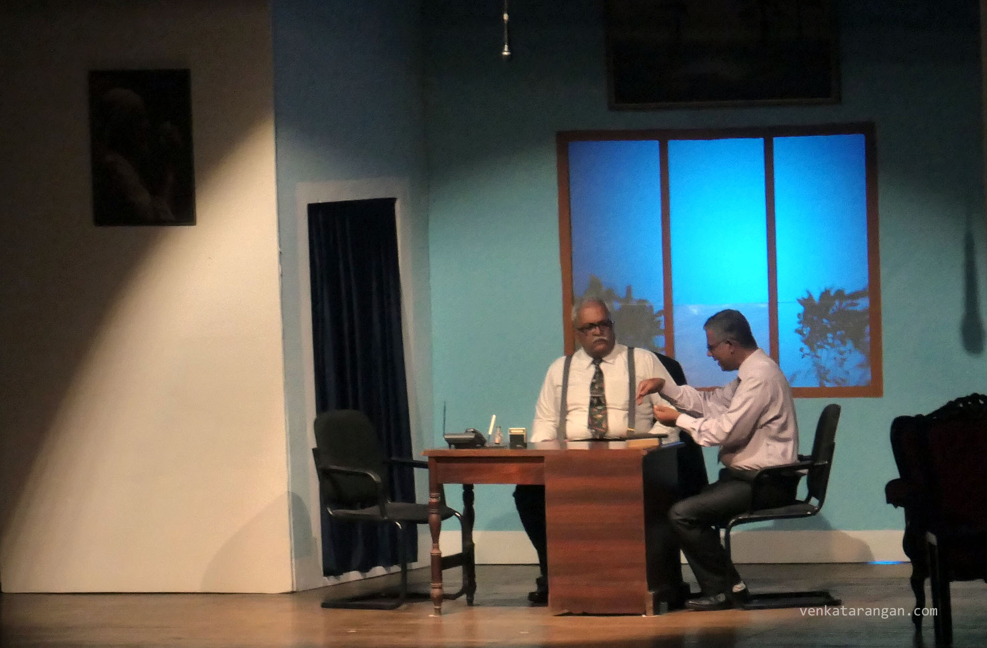 The Husband (Arun) explains to his boss why he signed the agreement
