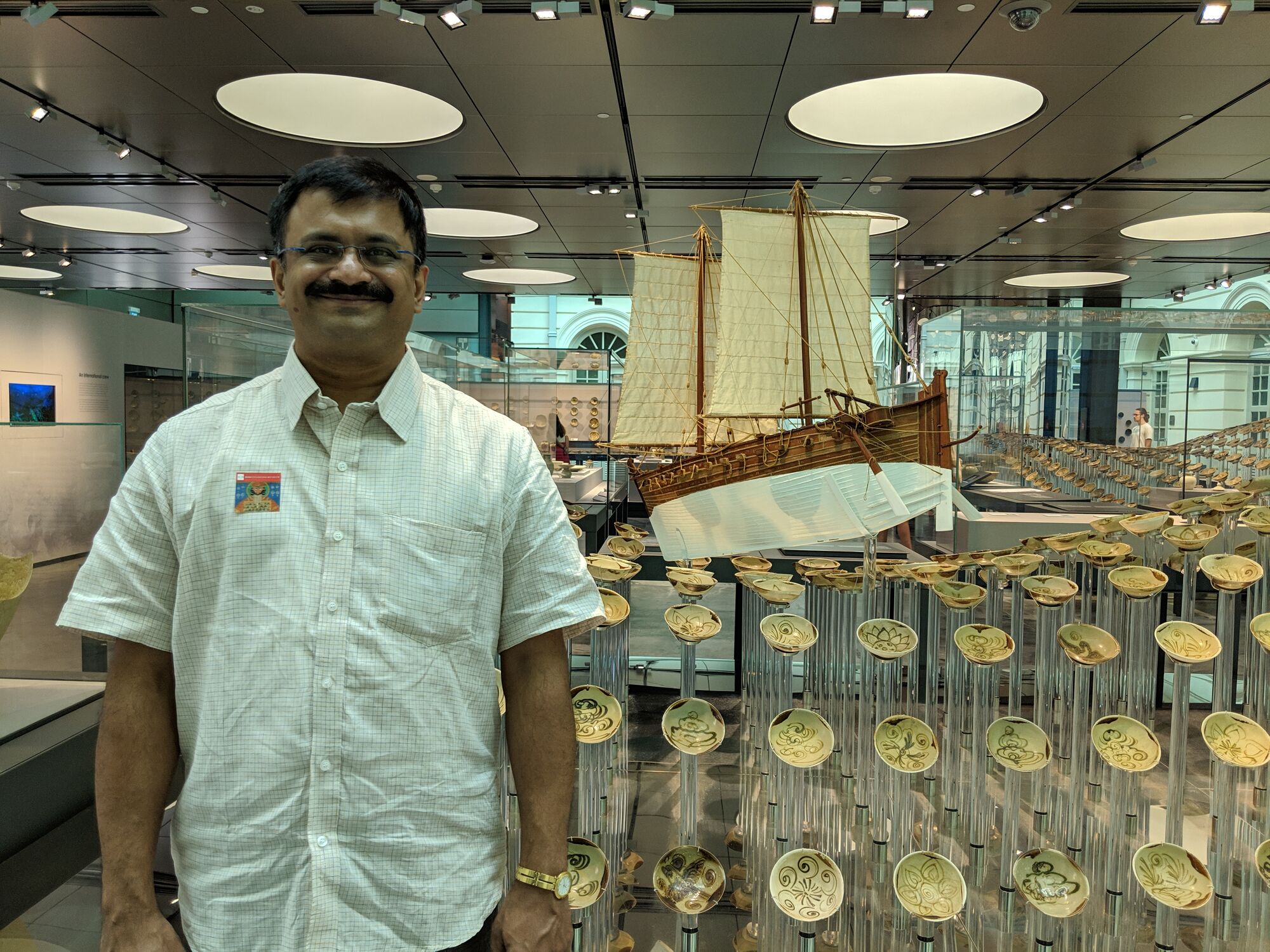 Venkatarangan in front of The Tang Shipwreck