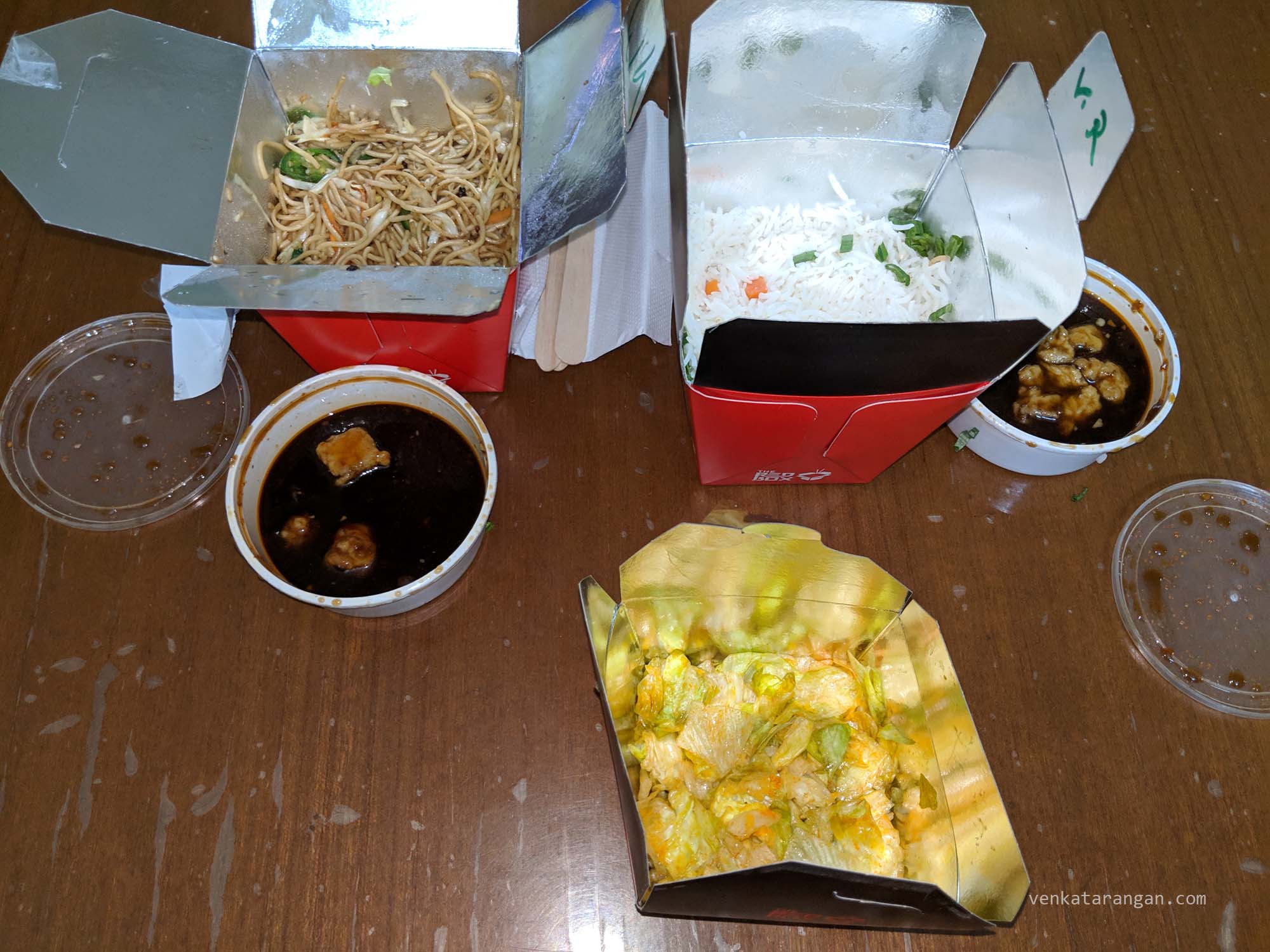 (Clockwise from left) Veg Chilli Garlic Noodles with Kung Pao Paneer, Veg Fried Rice with schezwan cauliflower, and, Thai Lettuce Salad. 