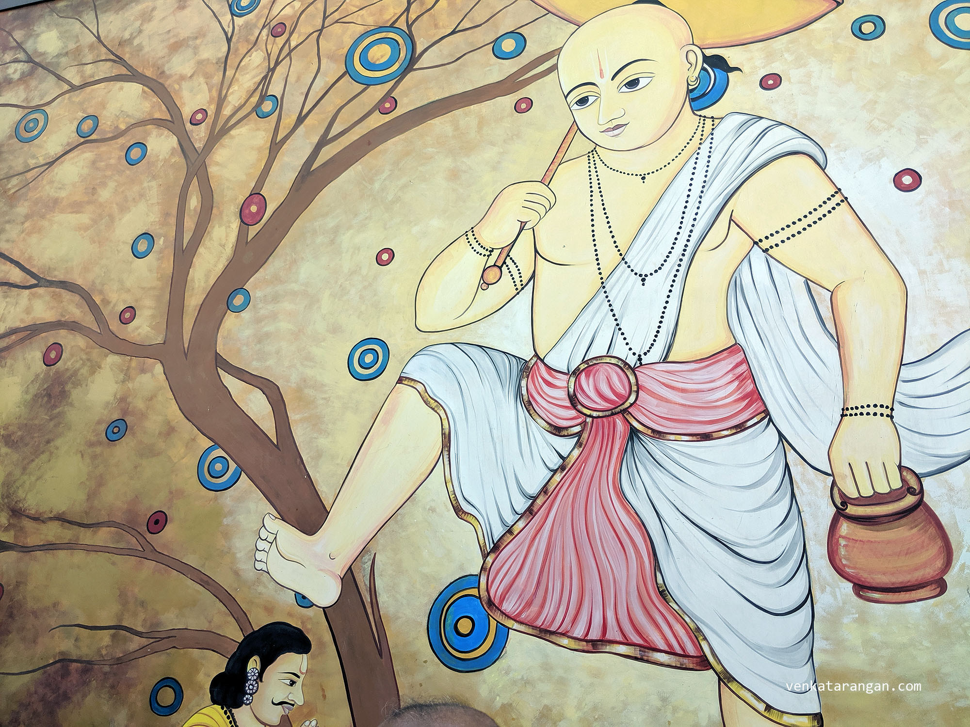 Dasavaratharam - 5. The Vamana (The Dwarf) is shown by a mural that is 15 feet in height that depicts the moment when Mahabali offers his head to the lord.