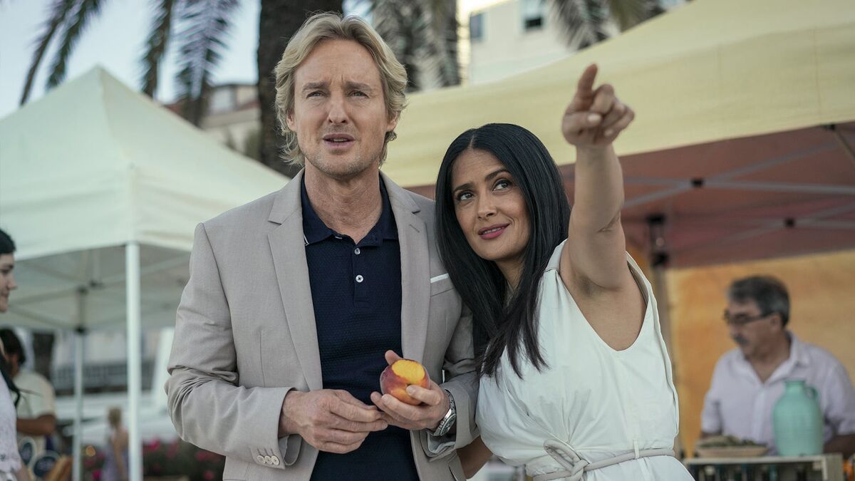 Owen Wilson as Greg Wittle and Salma Hayek as Isabel Clemens
