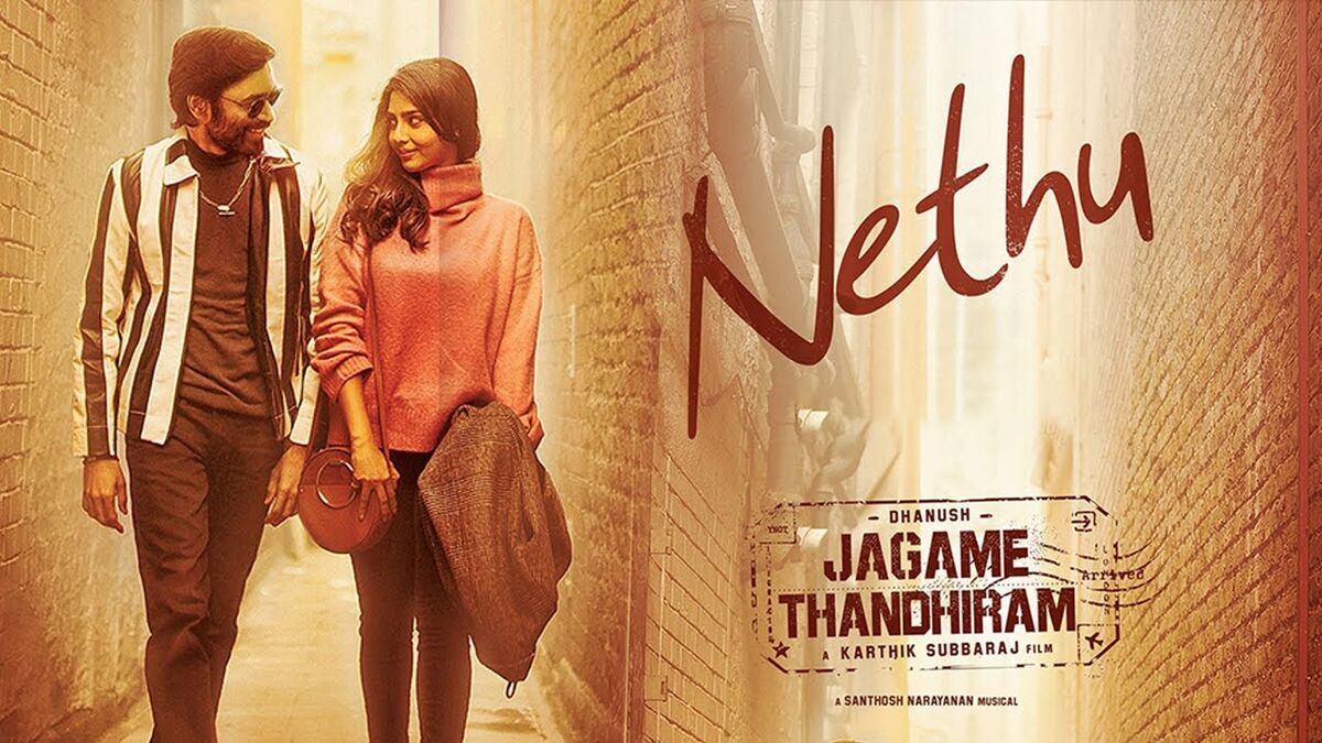 Dhanush as Suruli and Aishwarya Lekshmi as Attilla