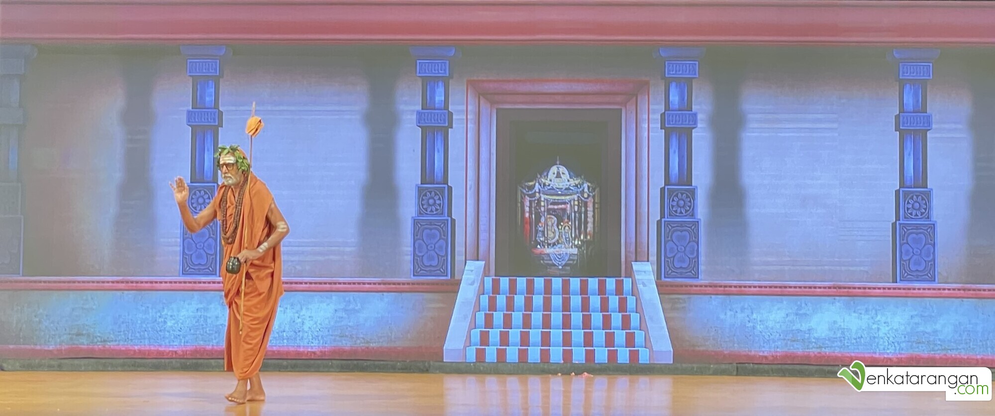 Mr Vasudevan brought to life the image of Swamigal in a saffron robe, holding a wooden danda and wearing a leaf garland as a crown